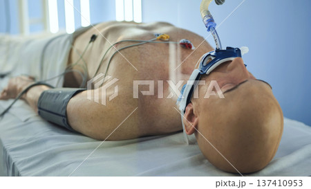 Medical training mannequin featuring intubation tube and vital sign monitors Medical training mannequin featuring intubation tube and vital sign monitors 137410953