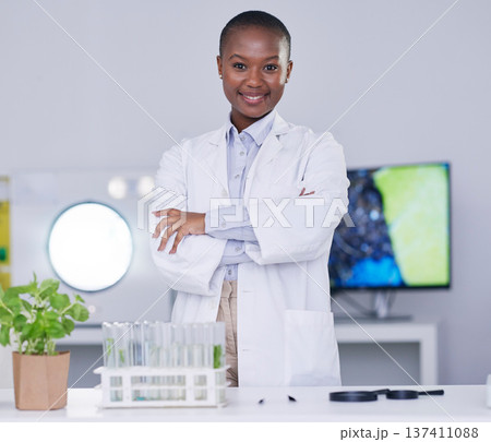 Black woman, portrait and scientist with arms crossed in lab, office and confidence for biotechnology research or work. Science, laboratory and expert with innovation in African plants or biology Black woman, portrait and scientist with arms crossed in lab, office and confidence for biotechnology research or work. Science, laboratory and expert with innovation in African plants or biology 137411088