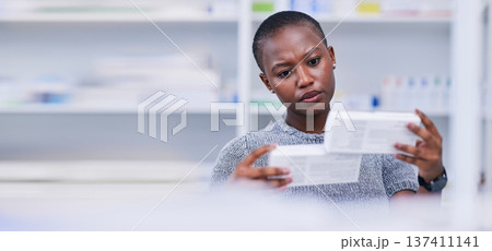 Pharmacy, product choice and black woman, customer or client reading pills box label, instruction or medication. Mockup space, supplements comparison and African person with medicine brand decision Pharmacy, product choice and black woman, customer or client reading pills box label, instruction or medication. Mockup space, supplements comparison and African person with medicine brand decision 137411141