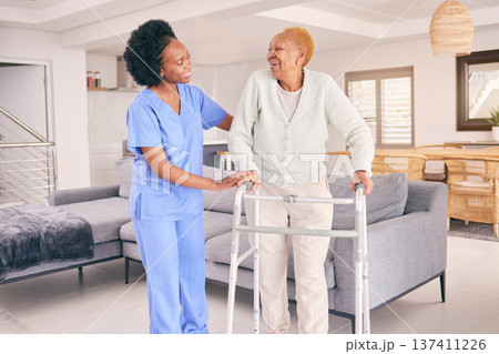 Nurse, senior woman and walking frame for homecare, healthcare service and muscle health and disability support. Medical physiotherapy, doctor helping and african elderly patient in living room Nurse, senior woman and walking frame for homecare, healthcare service and muscle health and disability support. Medical physiotherapy, doctor helping and african elderly patient in living room 137411226
