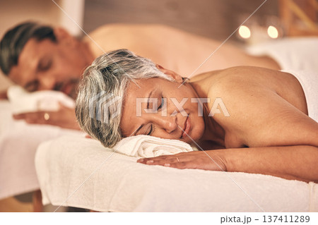 Relax, massage and mature couple in spa for holiday, vacation and marriage anniversary for wellness. Love, luxury resort and man and woman in salon for beauty, therapy and skincare treatment in hotel 137411289