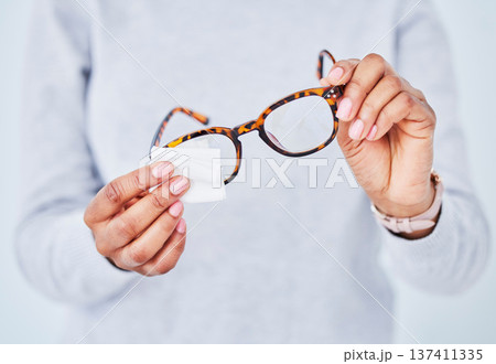 Hands, cleaning lens and glasses, hygiene and vision with eye care and health, wipe and dust with pattern frame. Optometry, visual and person with eyewear, maintenance and wellness with improvement Hands, cleaning lens and glasses, hygiene and vision with eye care and health, wipe and dust with pattern frame. Optometry, visual and person with eyewear, maintenance and wellness with improvement 137411335