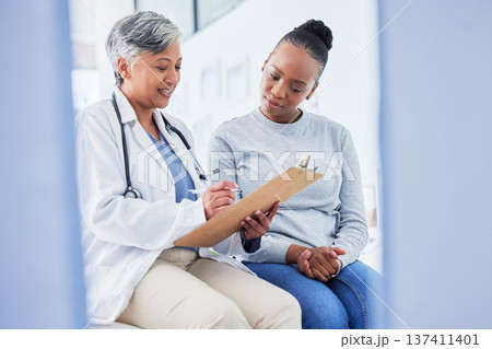 Doctor, women and checklist in healthcare support, hospital services and patient history, charts or results. Senior nurse writing on clipboard for registration, clinic sign up or medical consultation 137411401