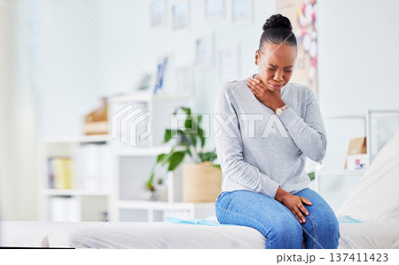 Black woman, sick and throat virus on bed at hospital waiting for doctor in checkup, visit or appointment. Frustrated African female person or patient with sore neck, infection or cough at the clinic Black woman, sick and throat virus on bed at hospital waiting for doctor in checkup, visit or appointment. Frustrated African female person or patient with sore neck, infection or cough at the clinic 137411423