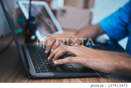 Hands, laptop and surveillance with a security guard in a CCTV room closeup to monitor criminal activity. Computer, safety and typing with an officer searching for evidence or information online 137411472
