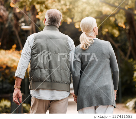 Holding hands, love and back with old couple in nature for bonding, happy and support. Relax, happiness and retirement with senior man and woman walking in countryside for vacation and commitment Holding hands, love and back with old couple in nature for bonding, happy and support. Relax, happiness and retirement with senior man and woman walking in countryside for vacation and commitment 137411582