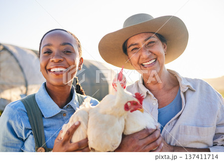 Farm, chicken and portrait of women in field for animal inspection, growth and health of birds. Agriculture, small business and farmers smile for free range poultry, protein and eggs production Farm, chicken and portrait of women in field for animal inspection, growth and health of birds. Agriculture, small business and farmers smile for free range poultry, protein and eggs production 137411714