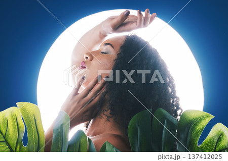 Skincare, neon and face of woman with leaf for wellness, natural cosmetics and beauty in studio. Circle light, salon aesthetic and profile of person for makeup, glamour and facial on blue background Skincare, neon and face of woman with leaf for wellness, natural cosmetics and beauty in studio. Circle light, salon aesthetic and profile of person for makeup, glamour and facial on blue background 137412025