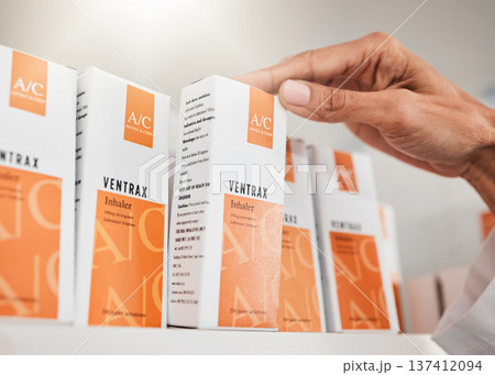 Person, pharmacist and hands with box for inventory inspection or checking stock on shelf at pharmacy. Closeup of medical or healthcare worker with pills, medication or pharmaceutical at drugstore Person, pharmacist and hands with box for inventory inspection or checking stock on shelf at pharmacy. Closeup of medical or healthcare worker with pills, medication or pharmaceutical at drugstore 137412094