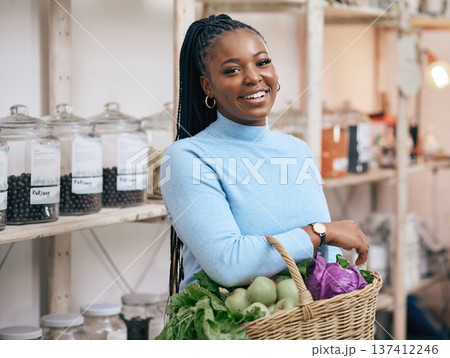 Black woman, portrait and shopping basket with vegetables, healthy food and diet produce in local grocery store. Smile, face and African customer or nutritionist in retail supermarket for fruit sales Black woman, portrait and shopping basket with vegetables, healthy food and diet produce in local grocery store. Smile, face and African customer or nutritionist in retail supermarket for fruit sales 137412246