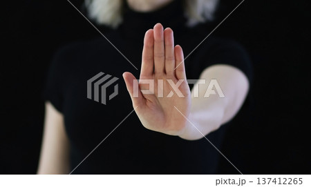 Palm in front of you, which means stop, enough, stop, calm down Palm in front of you, which means stop, enough, stop, calm down 137412265
