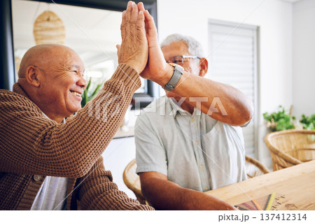 Senior game, happy and men with a high five for success, motivation or a win. Smile, together and elderly people with a hand gesture for support, goal or trust in a retirement home with solidarity 137412314
