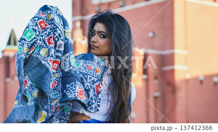 Bangladeshi girl posing in front of Moscow landmark, cultural diversity and travel 137412366