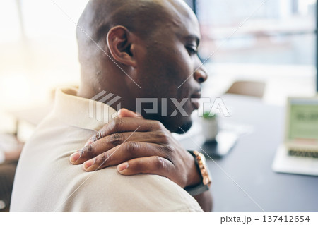 Stress, work and a black man with hand for back pain, massage and health problem. Burnout, tired and an African employee holding a shoulder or feeling a muscle injury in an office from an accident Stress, work and a black man with hand for back pain, massage and health problem. Burnout, tired and an African employee holding a shoulder or feeling a muscle injury in an office from an accident 137412654