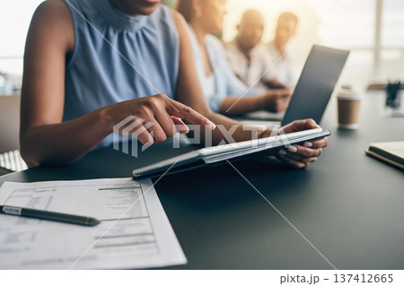 Business people, hands and tablet for planning, website information and meeting agenda, FAQ or marketing research. Professional worker or employees scroll or typing on digital technology in workspace Business people, hands and tablet for planning, website information and meeting agenda, FAQ or marketing research. Professional worker or employees scroll or typing on digital technology in workspace 137412665