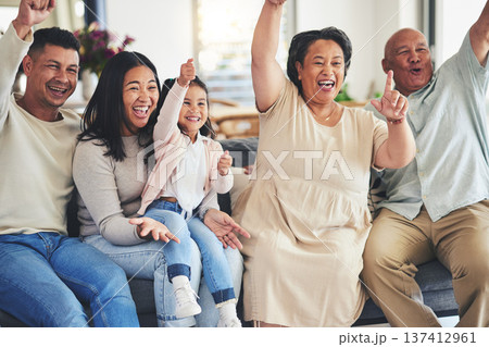 Happy family, child or grandparents in celebration for sports in home living room watching tv together. Grandfather, score or excited mother cheering with dad, kid fan or grandmother for goal success 137412961