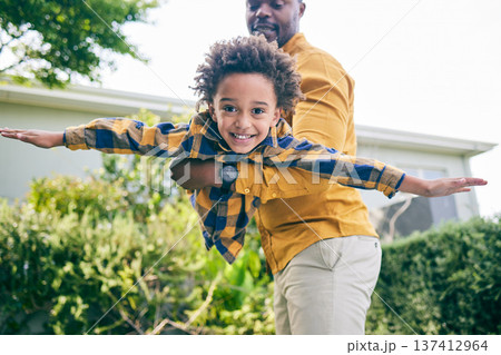Portrait, garden or child playing with father to relax or bond as a happy family with love or care, Smile, flying airplane or African dad with kid to enjoy fun games on holiday together in backyard Portrait, garden or child playing with father to relax or bond as a happy family with love or care, Smile, flying airplane or African dad with kid to enjoy fun games on holiday together in backyard 137412964