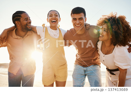 Beach sunset, happy and group of friends hug, smile and enjoy travel vacation, summer freedom or tropical adventure. Solidarity, portrait and young people excited, bond and laugh on student getaway Beach sunset, happy and group of friends hug, smile and enjoy travel vacation, summer freedom or tropical adventure. Solidarity, portrait and young people excited, bond and laugh on student getaway 137413089