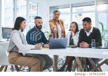 Laptop, woman or business people for teamwork, problem solving in discussion of solution or mission. Computer, leadership or mature mentor talking or pointing to project ideas or advice for employees Laptop, woman or business people for teamwork, problem solving in discussion of solution or mission. Computer, leadership or mature mentor talking or pointing to project ideas or advice for employees 137413245