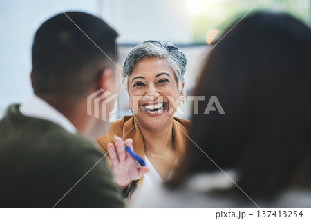Team, happy woman or business people in meeting laughing at funny joke in discussion or collaboration together. Smile, leadership or excited mature mentor talking or speaking of ideas to employees Team, happy woman or business people in meeting laughing at funny joke in discussion or collaboration together. Smile, leadership or excited mature mentor talking or speaking of ideas to employees 137413254