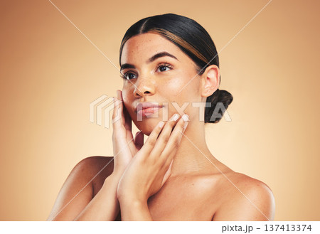 Thinking, skincare and woman with natural beauty, dermatology and wellness on brown studio background. Person, idea and model with luxury, treatment and healthy skin with makeup, hygiene or aesthetic 137413374