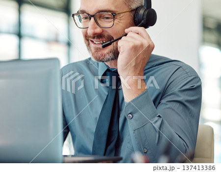 Senior, happy man and call center on laptop with headphones in customer service or telemarketing at office. Mature businessman, consultant or agent smile in online advice, help or contact us at desk Senior, happy man and call center on laptop with headphones in customer service or telemarketing at office. Mature businessman, consultant or agent smile in online advice, help or contact us at desk 137413386