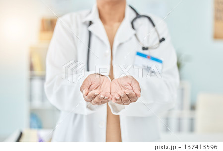 Palm, healthcare and hands of a doctor for help, support or charity at a hospital. Closeup, work and a nurse or surgeon with a gesture for donation, prayer or faith at a clinic for medical trust 137413596