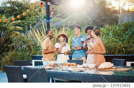 Laughing, diversity and friends at lunch in a garden with drinks, conversation and talking at a party. Happy, alcohol and group of men and women at an outdoor backyard dinner with communication Laughing, diversity and friends at lunch in a garden with drinks, conversation and talking at a party. Happy, alcohol and group of men and women at an outdoor backyard dinner with communication 137413601