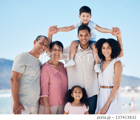 Beach, big family and portrait together with smile, love and generations embrace on summer holiday in Mexico. Happy parents, grandparents and children on ocean holiday travel in nature with blue sky. 137413632