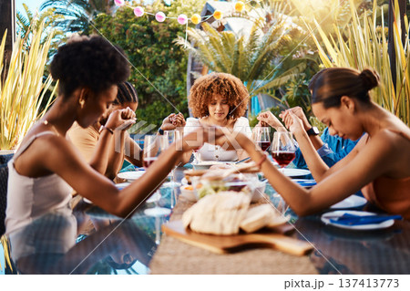 Food, people and holding hands to pray outdoor at table for gratitude and holiday celebration. Group of friends together at lunch, party or reunion with drinks in garden for thanks, prayer and grace 137413773