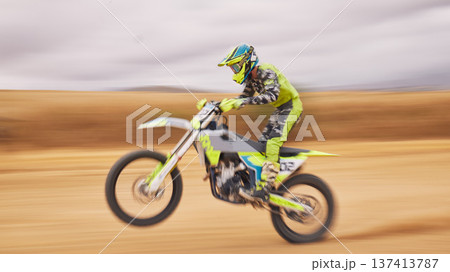 Fast, nature and a person on a motorbike for sports, travel or freedom in a race. Cycling, power and a man or professional driver with energy on a bike while driving for a challenge on a course 137413787
