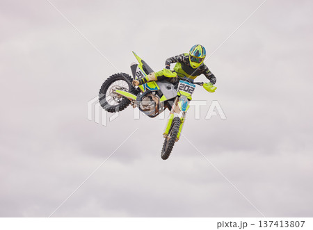 Speed, active and a person on a motorbike for a race, travel or cycling with, sports and freedom with training. Rider, power and a man or professional driver with energy on a bike with a challenge Speed, active and a person on a motorbike for a race, travel or cycling with, sports and freedom with training. Rider, power and a man or professional driver with energy on a bike with a challenge 137413807