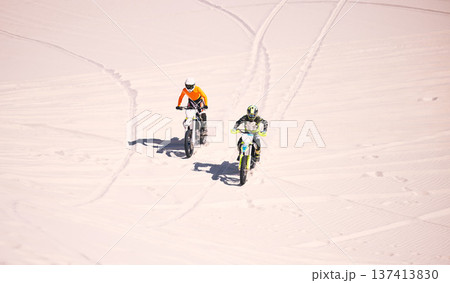 Dune, off road and men on motorbike together for practice, training and extreme sports energy in nature. Professional dirt biking challenge, friends and danger with motorcycle competition in desert. Dune, off road and men on motorbike together for practice, training and extreme sports energy in nature. Professional dirt biking challenge, friends and danger with motorcycle competition in desert. 137413830