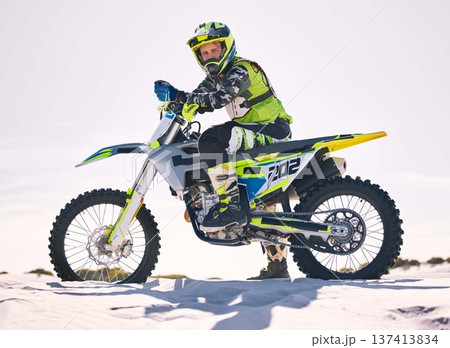 Sports, desert and portrait of man on motorbike for race training, workout and challenge on sand. Extreme transport, travel and male cyclist with motorcycle for adventure, freedom and adrenaline Sports, desert and portrait of man on motorbike for race training, workout and challenge on sand. Extreme transport, travel and male cyclist with motorcycle for adventure, freedom and adrenaline 137413834