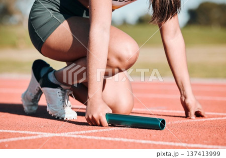 Start, running and relay with hands of person on race track with baton for sports, competition and marathon. Exercise, health and wellness with closeup of runner in stadium for challenge and athlete 137413999