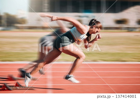 Action, speed and women athlete running sprint in competition for fitness game and training for energy wellness on a track. Sports, stadium and athletic people or runner exercise, speed and workout Action, speed and women athlete running sprint in competition for fitness game and training for energy wellness on a track. Sports, stadium and athletic people or runner exercise, speed and workout 137414001