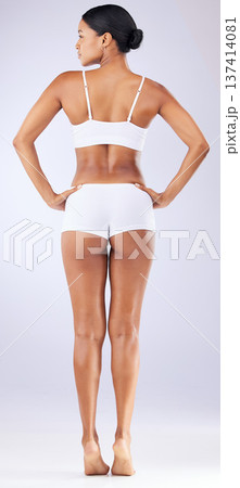Beauty, underwear and back of woman in a studio with wellness, health and weightloss routine. Fitness, body and full length of female model with cosmetic liposuction for self care by white background Beauty, underwear and back of woman in a studio with wellness, health and weightloss routine. Fitness, body and full length of female model with cosmetic liposuction for self care by white background 137414081