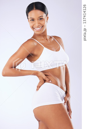 Portrait, underwear or woman in studio for body health or wellness on white background for diet to lose weight. Self care, smile or happy model with smooth stomach, glow or skin at spa for beauty 137414126