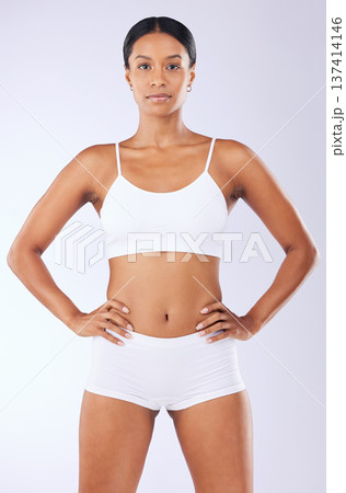 Portrait, health and woman in a bikini, wellness and training on a white studio background. Person, girl and model with exercise with fitness, weight loss and self care with confidence and aesthetic Portrait, health and woman in a bikini, wellness and training on a white studio background. Person, girl and model with exercise with fitness, weight loss and self care with confidence and aesthetic 137414146