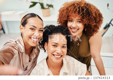 Selfie, office or portrait of happy friends taking a photograph together for teamwork on workplace break. Fashion designers, faces or excited group of people in a picture for a social media memory Selfie, office or portrait of happy friends taking a photograph together for teamwork on workplace break. Fashion designers, faces or excited group of people in a picture for a social media memory 137414313