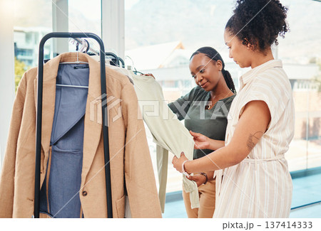Consultant, fashion and shopping with black woman in store for clothes, fabric or products on promotion. Sale, stylist or African customer in boutique mall for service help, deal or discount offer Consultant, fashion and shopping with black woman in store for clothes, fabric or products on promotion. Sale, stylist or African customer in boutique mall for service help, deal or discount offer 137414333