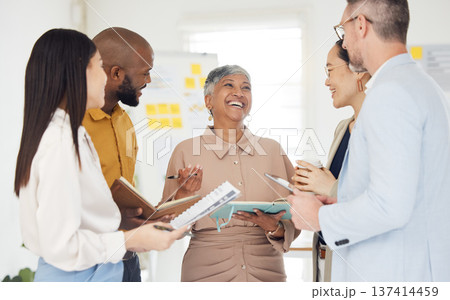 Tablet, collaboration and documents with a business team laughing in the office during a meeting. Technology, paper and funny with a manager talking to an employee group in a professional workplace 137414459