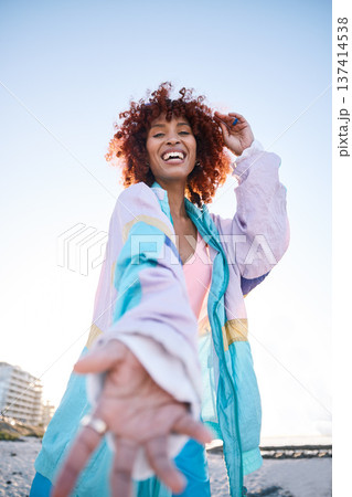 Portrait, happy woman and helping hand, offer or invitation at beach in low angle mockup space. Smile, palm and African person giving assistance in support, care or acceptance of handshake to welcome Portrait, happy woman and helping hand, offer or invitation at beach in low angle mockup space. Smile, palm and African person giving assistance in support, care or acceptance of handshake to welcome 137414538