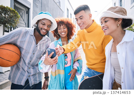 Gen z friends, phone and street with laugh, meme and streaming on social network, blog and happy in city. Student group, men and women with smartphone, comic video or point on web in Los Angeles cbd 137414653