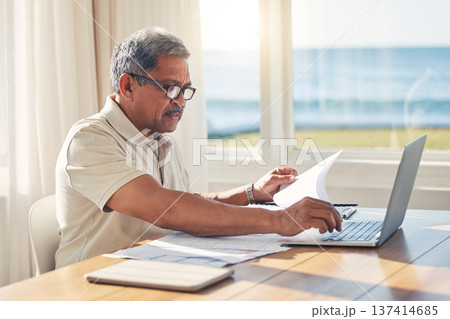 Senior man, laptop and documents in budget planning, schedule payment or checking bills at home. Mature male person working on computer, paperwork or expenses in finance, insurance or retirement plan Senior man, laptop and documents in budget planning, schedule payment or checking bills at home. Mature male person working on computer, paperwork or expenses in finance, insurance or retirement plan 137414685