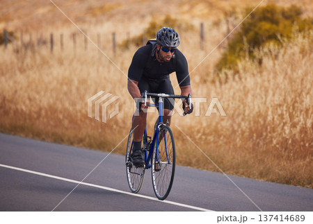 Fitness, nature and bicycle, man on road for workout exercise and scenic mountain path. Health, wellness and cyclist on bike on summer morning for training, practice and cycling race in countryside. 137414689