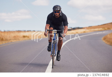 Portrait, street and man on a bike for fitness, countryside cycling or training for a competition. Serious, sport and a male cyclist with a bicycle in the road for a race, adventure or nature cardio Portrait, street and man on a bike for fitness, countryside cycling or training for a competition. Serious, sport and a male cyclist with a bicycle in the road for a race, adventure or nature cardio 137414692