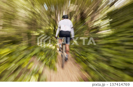 Blur motion, cycling and man in nature training for a race, marathon or competition in a forest. Fast, fitness and back of male cyclist athlete riding bicycle at speed for cardio exercise or workout. Blur motion, cycling and man in nature training for a race, marathon or competition in a forest. Fast, fitness and back of male cyclist athlete riding bicycle at speed for cardio exercise or workout. 137414769