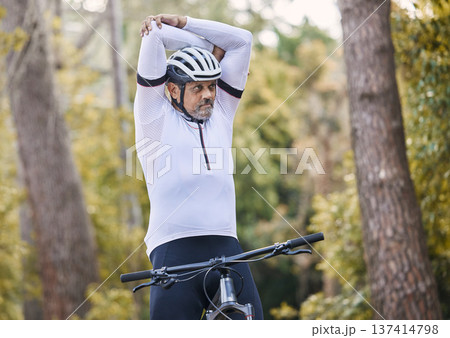 Nature, cycling and sports man stretching for exercise ride, fitness and journey on outdoor mountain bike challenge. Warm up, retirement wellness and mature athlete start bicycle workout in forest Nature, cycling and sports man stretching for exercise ride, fitness and journey on outdoor mountain bike challenge. Warm up, retirement wellness and mature athlete start bicycle workout in forest 137414798