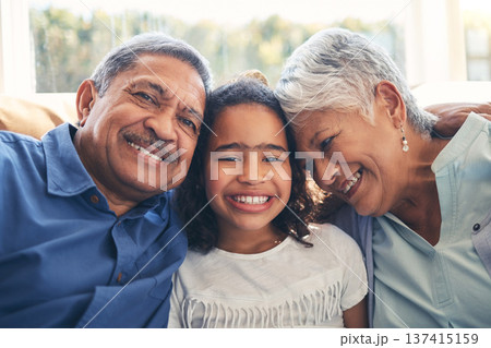 Grandparents, portrait and child smile in home living room on sofa, bonding and having fun together. Face, grandma and grandfather with kid in lounge to relax with love, care and family connection Grandparents, portrait and child smile in home living room on sofa, bonding and having fun together. Face, grandma and grandfather with kid in lounge to relax with love, care and family connection 137415159